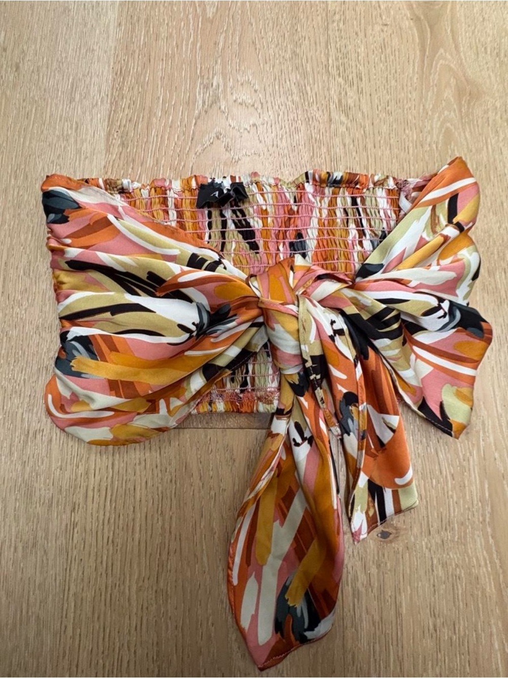 Aakaa Orange Pink Cream Smocked Strapless Bow Tie Crop Top